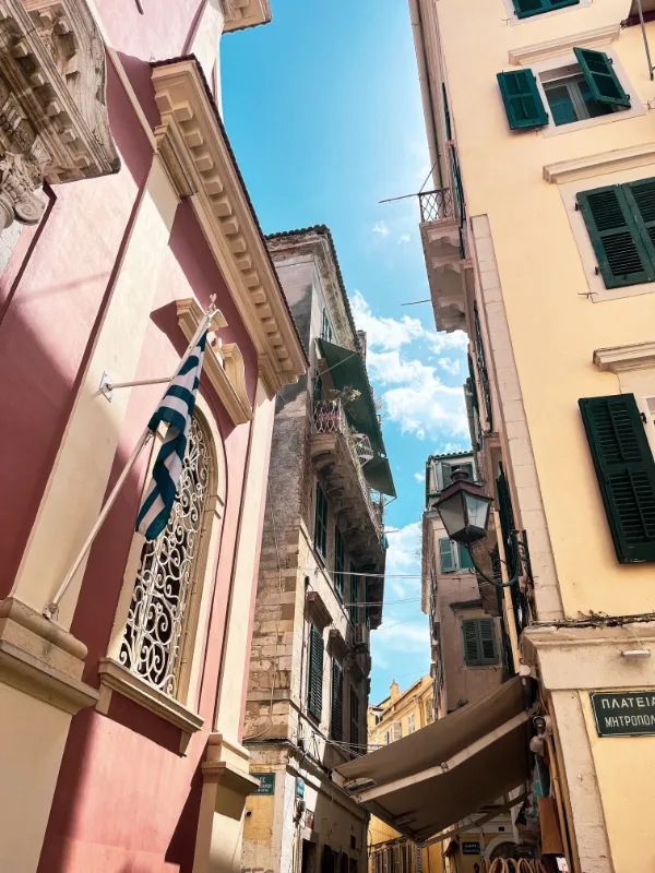 Street in Old Town in Corfu, Greece. Corfu is one of the best budget-friendly destinations in Europe. 