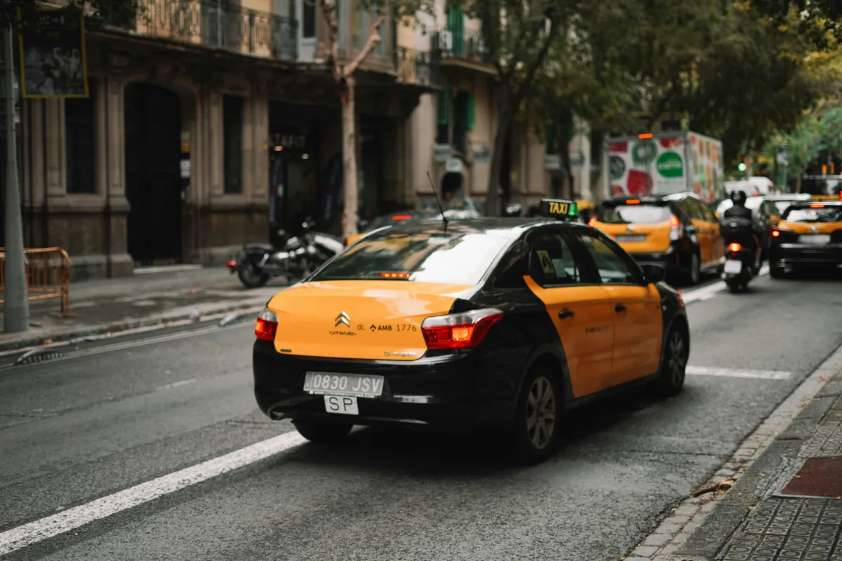 Picture of a taxi on the street.